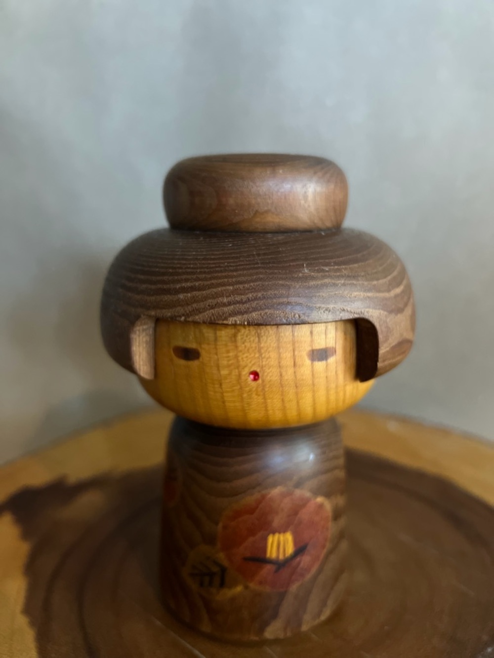 Wooden Kokeshi Doll with Floral Motif - Brown and Natural Wood